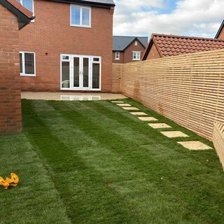 Patio turf with fencing and seating