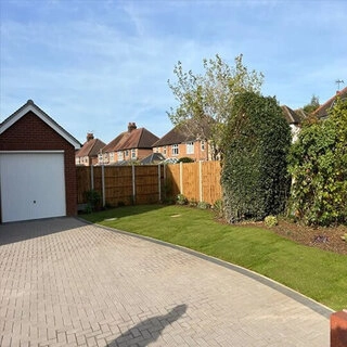 Block paving fencing and turf