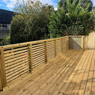 Decking with integrated fencing